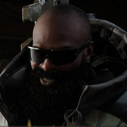 Hector wearing dark glasses and tactical gear